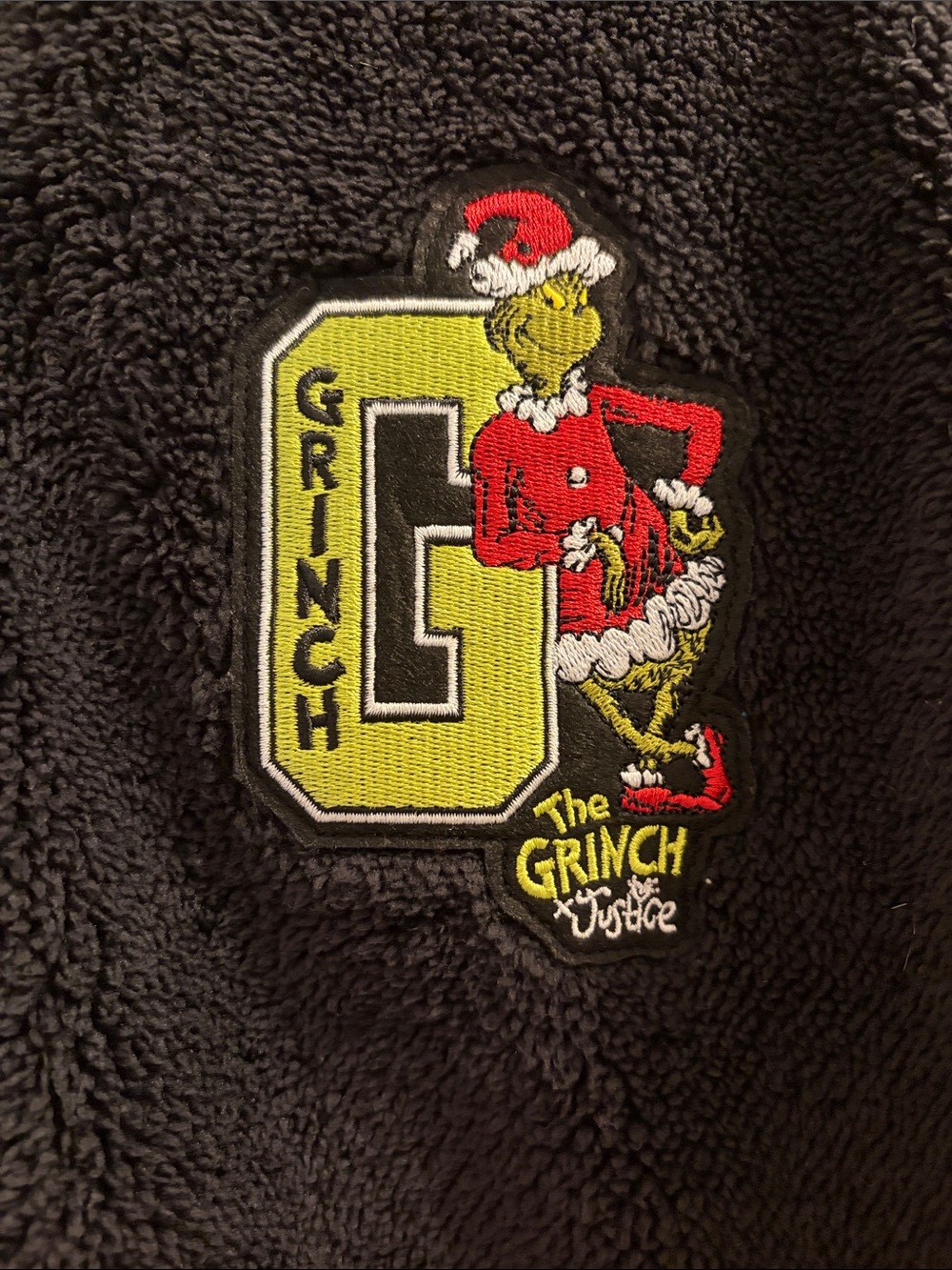 Justice Kids Black Sherpa Jacket with Grinch Patch - Red, Yellow, Green